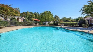 exterior pool the Millwood Park Apartments